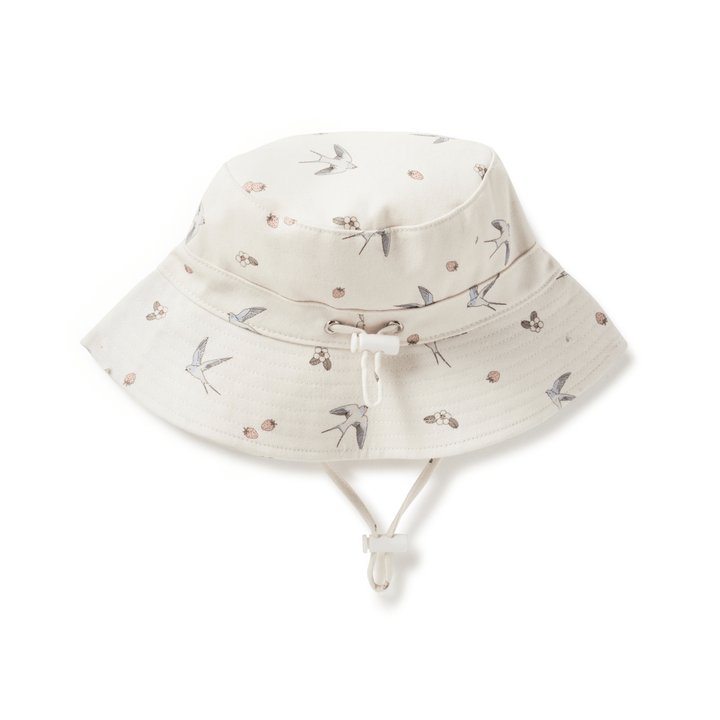 An Aster & Oak Bucket Hat - LUCKY LASTS - MEADOW & LION ONLY with flowers on it made from cotton canvas.