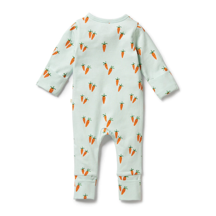 A little Wilson & Frenchy Organic Baby Easter Pyjamas with carrots on it.