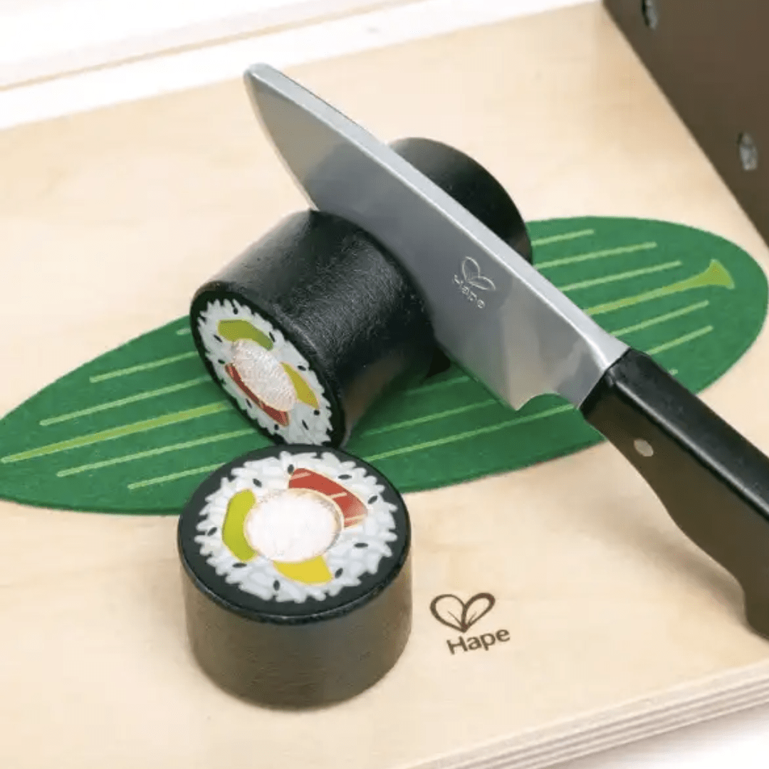 Close-Up-Of-Sushi-And-Knife-In-Hape-Sushi-Time-Naked-Baby-Eco-Boutique