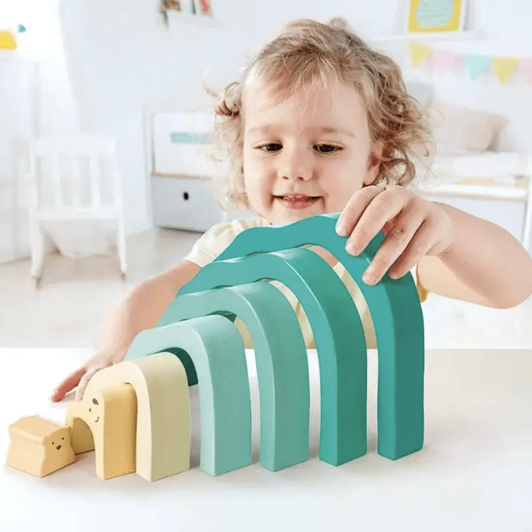 Happy-Chid-Stacking-Up-Hape-Stacking-Blocks-Arctic-Polar-Bear-Naked-Baby-Eco-Boutique