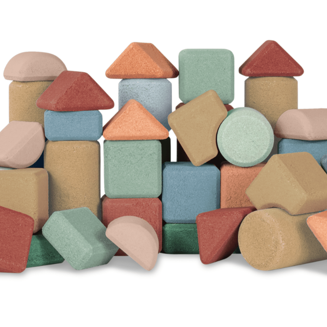 An eco-friendly Korko Block Set of colorful cork blocks on a white background.