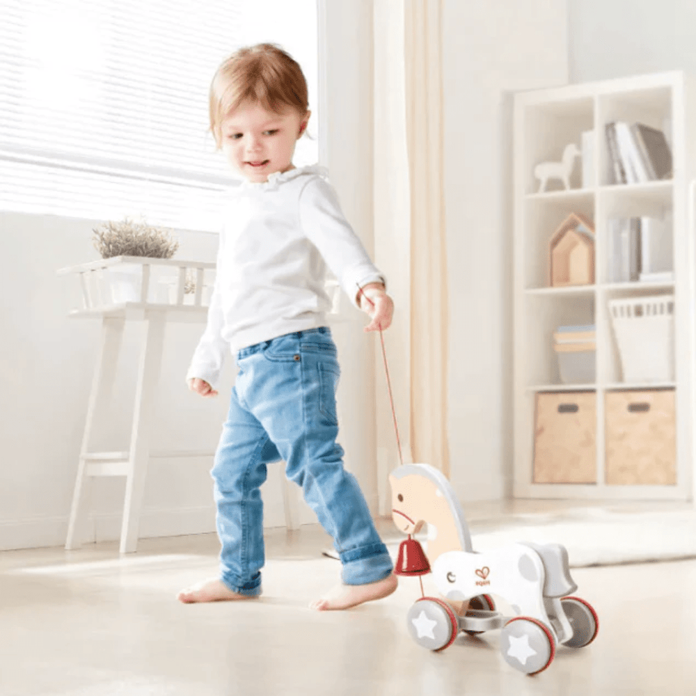 Little-Boy-Playing-With-Hape-Pull-Along-Pony-Naked-aby-Eco-Boutique