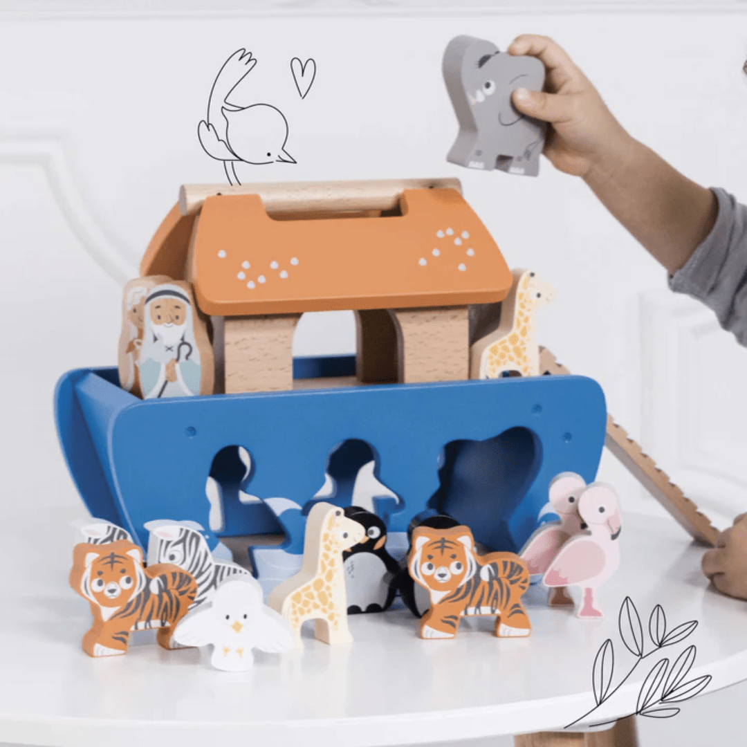 Little-Hand-Playing-With-Le-Toy-Van-Noahs-Shape-Sorter-Naked-Baby-Eco-Boutique