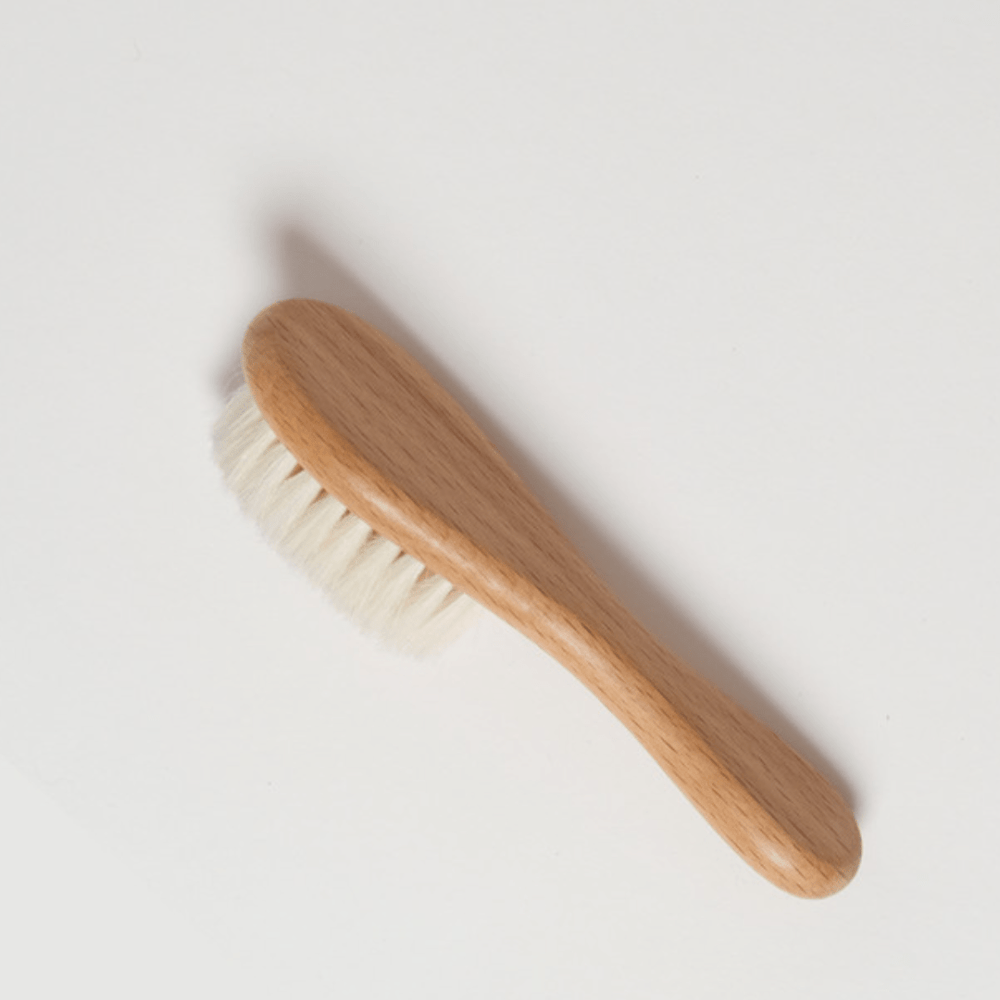 Side-View-of-Babu-Wooden-Baby-Hair-Brush-Naked-Baby-Eco-Boutique