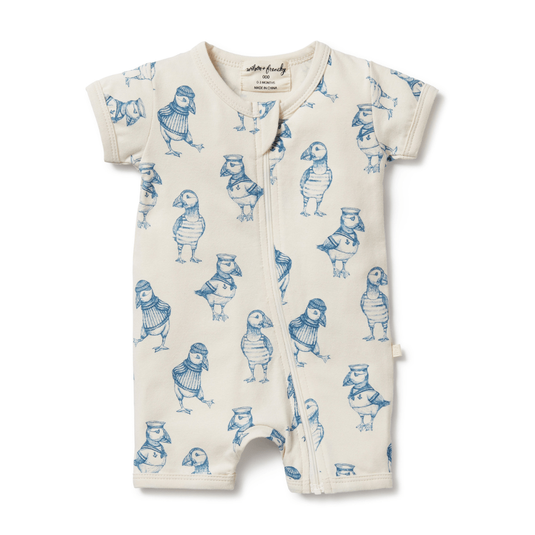 Baby onesie with blue owl print design on a white background, now available as a Wilson & Frenchy Organic Boyleg Zipsuit.