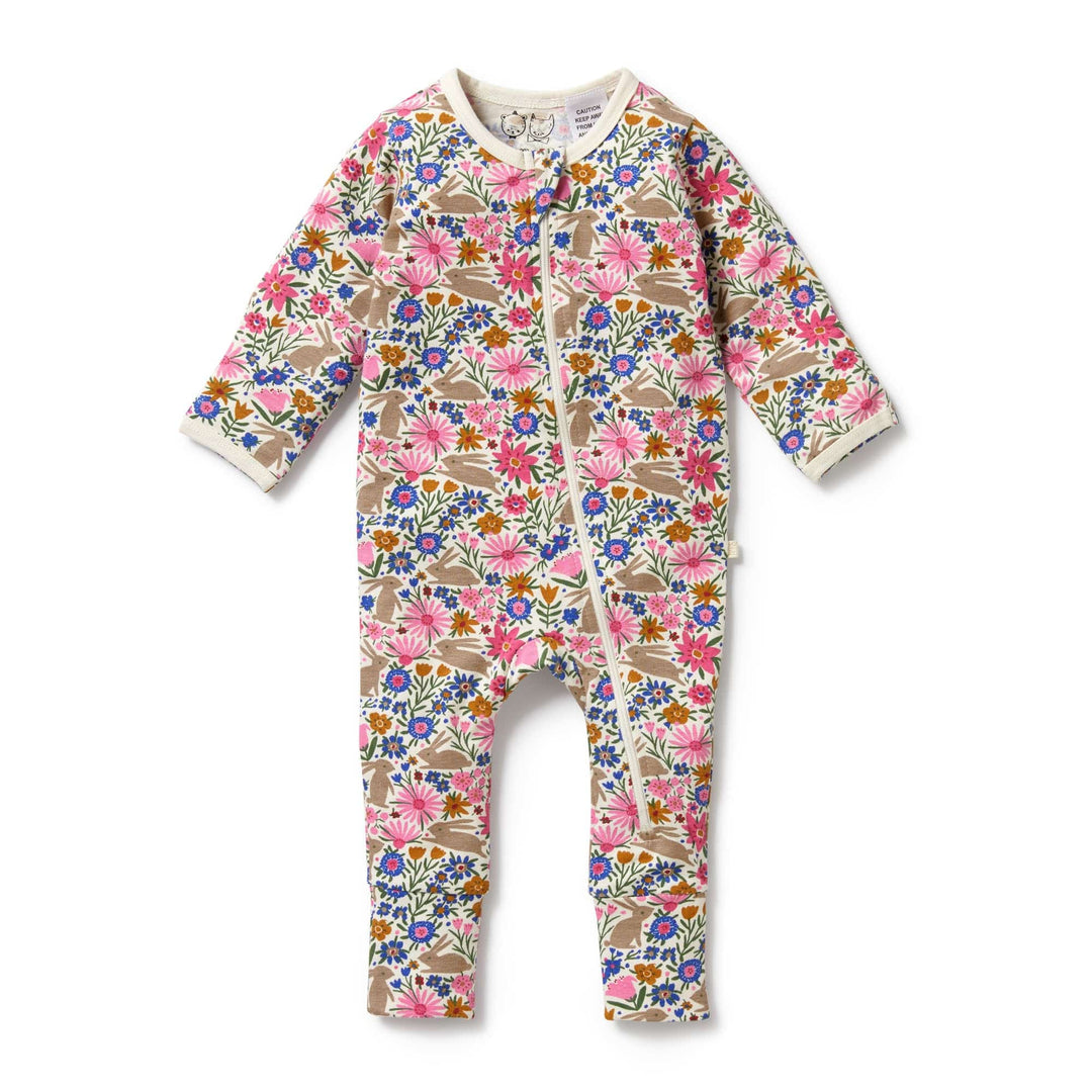A Wilson & Frenchy Organic Baby Easter Pyjamas with a floral print, perfect for serious snuggle time.