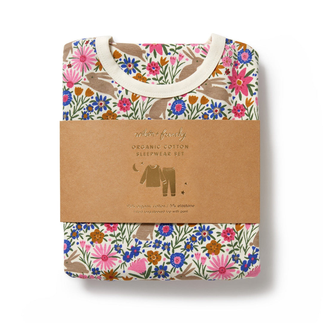 Folded floral Wilson & Frenchy Organic Long Sleeve Easter Pyjamas set with eco-friendly packaging.
