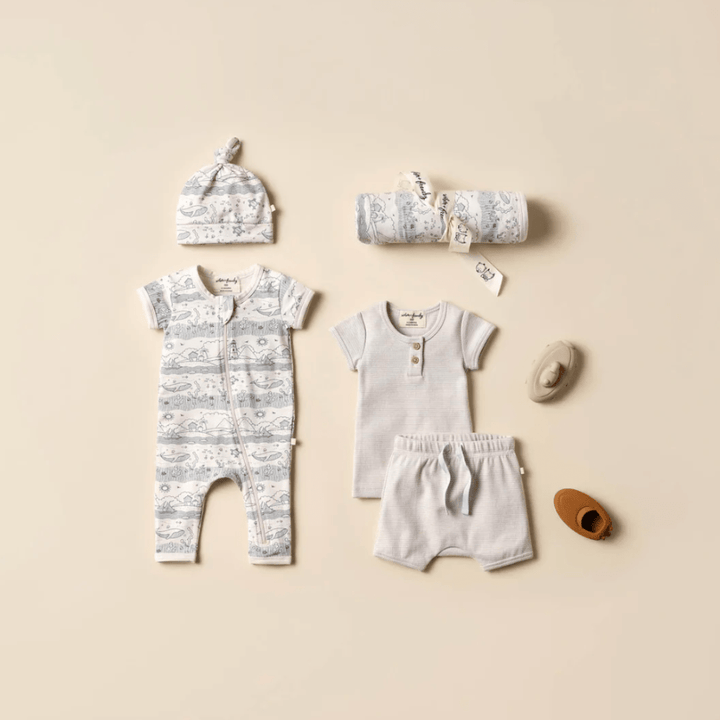 Layette-Flatlay-with-Wilson-and-Frenchy-Rib-Stripe-Henley-Tee-Dawn-Stripe-Naked-Baby-Eco-Boutique