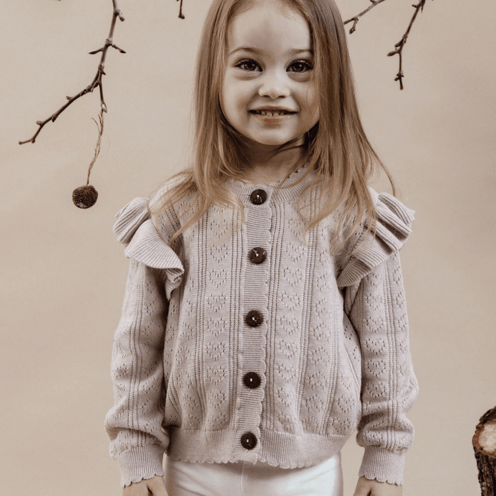 Little-Girl-Wearing-Aster-And-Oak-Organic-Ruffle-Knit-Cardigan-Naked-Baby-Eco-Boutique