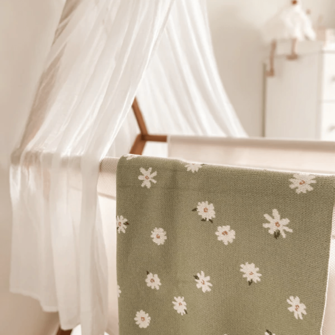Over-The-Dandelions-Organic-Cotton-Print-Blanket-Daisy-Thyme-On-Bassinet-Naked-Baby-Eco-Boutique