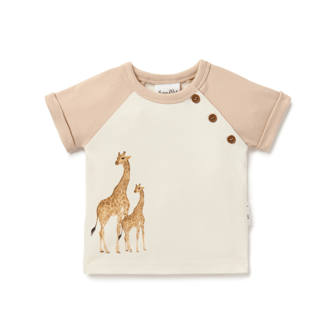 T-shirt for babies and kids with watercolour giraffe print by the right waist, three coconut buttons by the left shoulder, and contrasting taupe sleeves