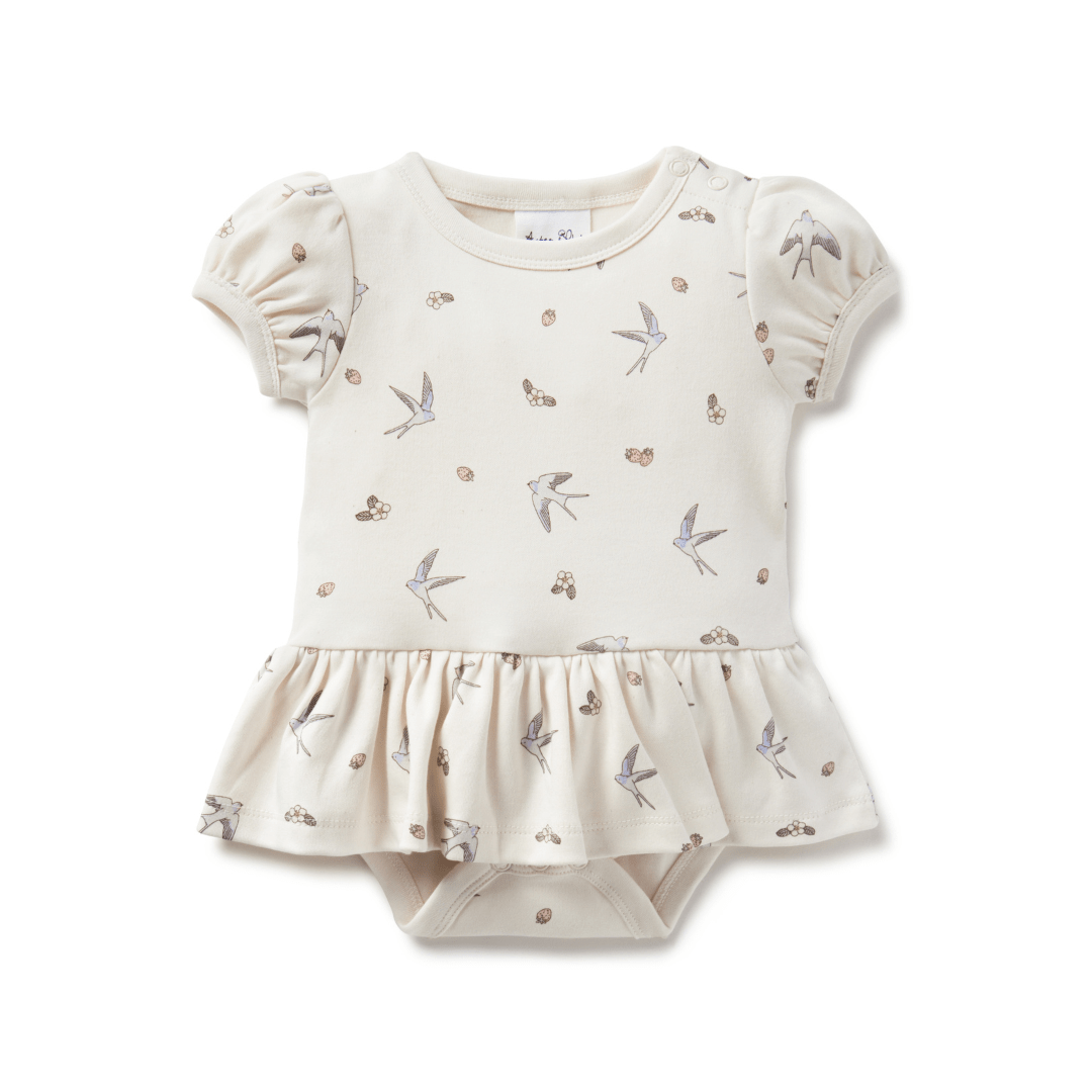 Natural-coloured baby onesie featuring a delicate all-over swallow and strawberry print, puff sleeves, and a little skirt up to the waist