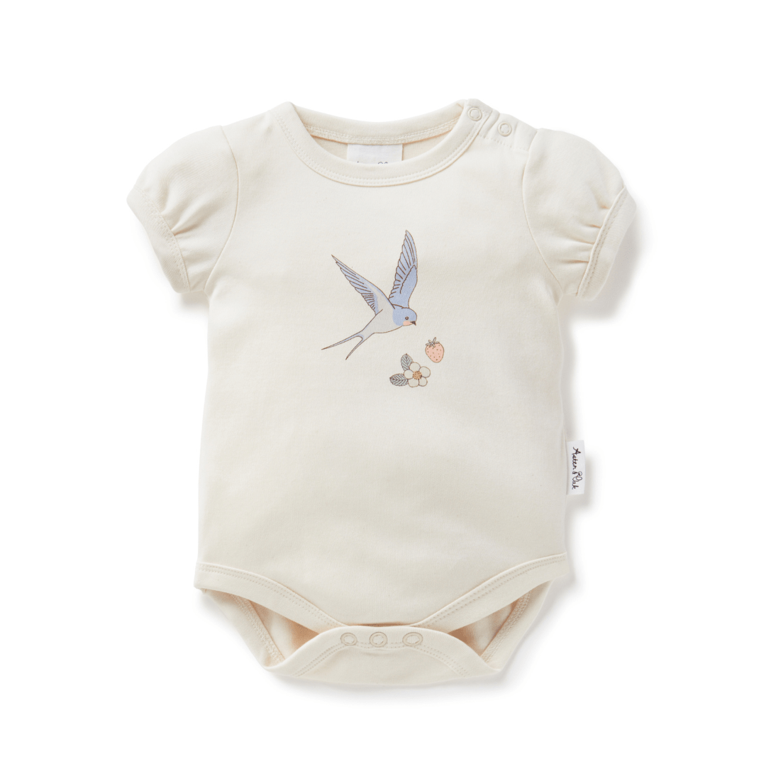 Baby onesie with puff sleeves and snaps at the crotch, featuring a delicate hand-illustrated swan print on the chest, with a strawberry and strawberry flower