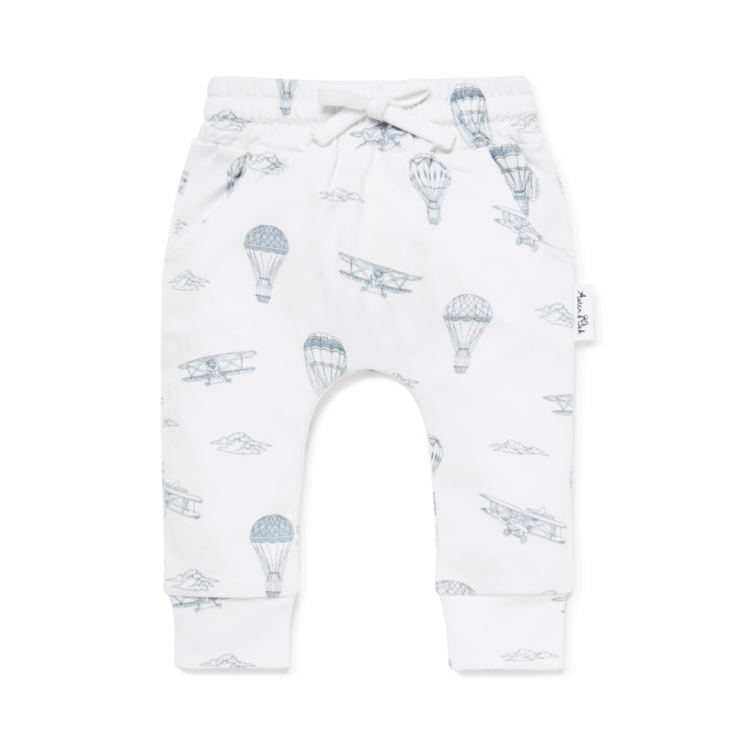 Toddler Aster & Oak Organic Harem Pants with hand-illustrated airplane and hot air balloon print on a white background.