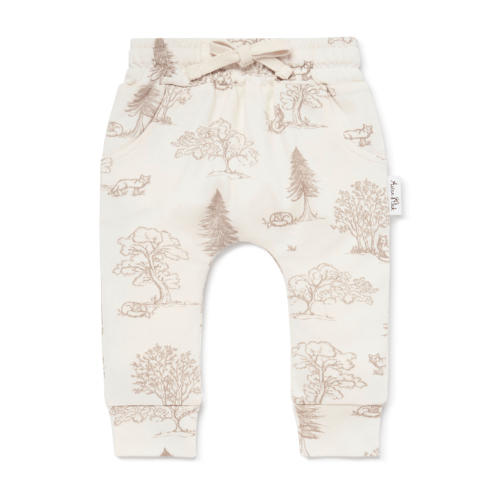 Aster & Oak GOTS-certified organic cotton infant's trousers with a forest print on a white background.