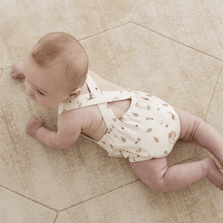 Baby-Showing-Back-Of-Aster-And-Oak-Organic-Happy-Holidays-Playsuit-Naked-Baby-Eco-Boutique