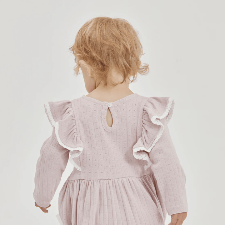 Back-Of-Aster-And-Oak-Organic-Violet-Ice-Bubble-Romper-On-Model-Naked-Baby-Eco-Boutique