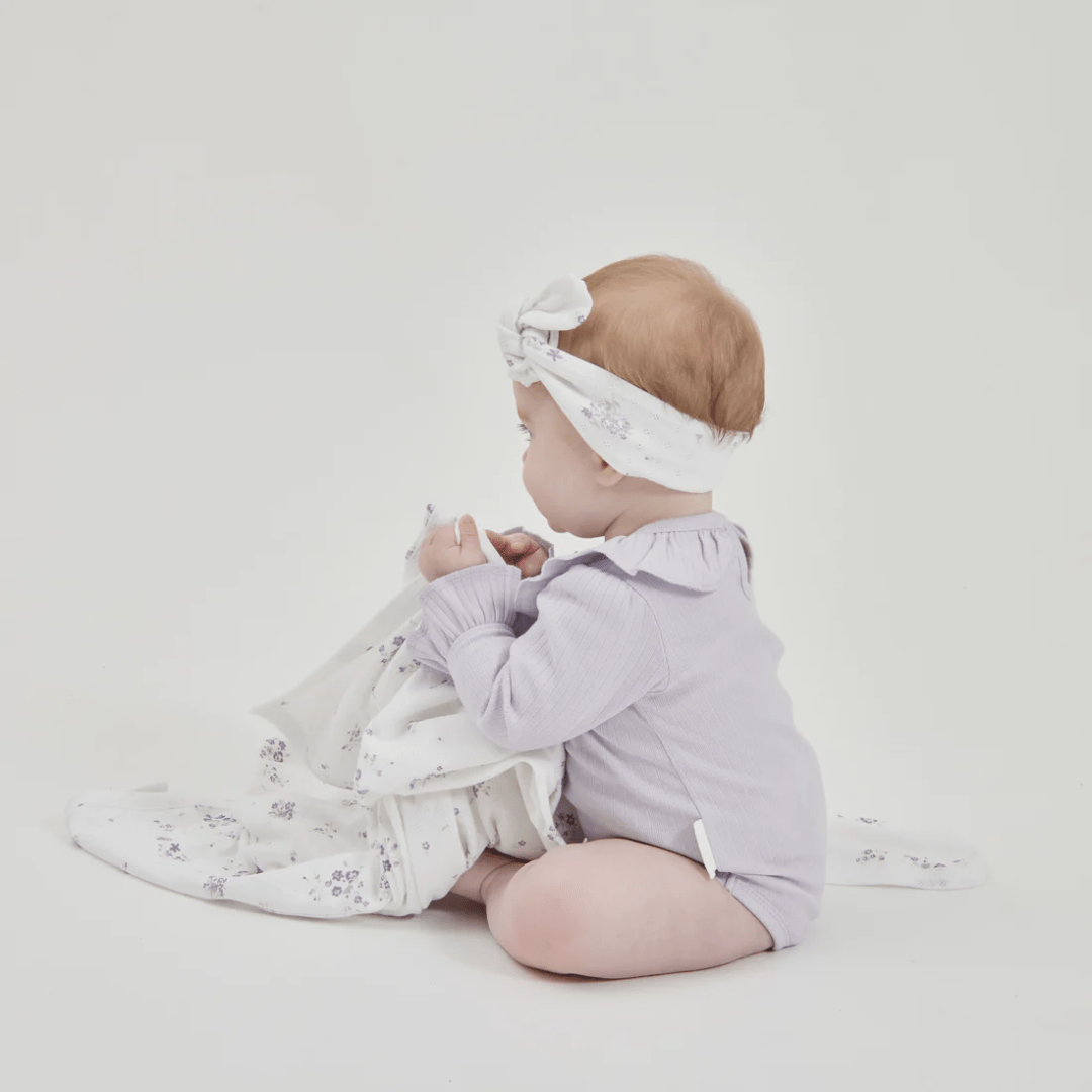 Back-Of-Aster-And-Organic-Lavender-Pointelle-Rib-Onesie-On-Little-Baby-Naked-Baby-Eco-Boutique