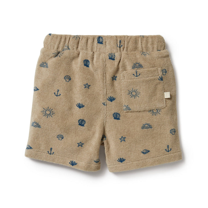 A beige Wilson & Frenchy Organic Terry Shorts perfect for summer, adorned with stars and anchors.