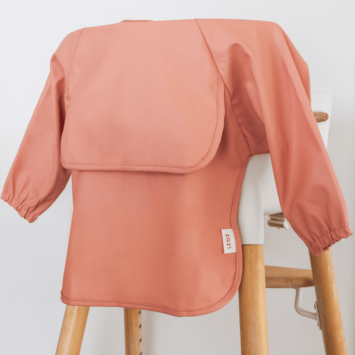 A Zazi Recycled Full-Sleeved Bib (Multiple Variants) with a waterproof, machine-washable sleeve on it.