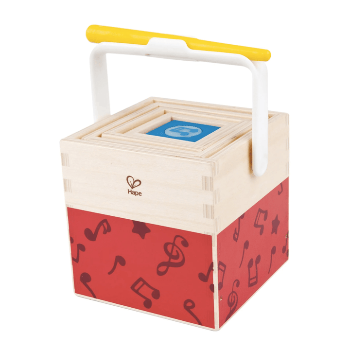 The Hape Stacking Music Set by Hape is a wooden toy box that features musical notes and a handle. This innovative set combines the fun of stacking blocks with the joy of creating music, making it perfect for children.