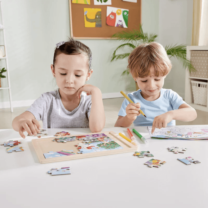 Boy-And-Girl-Doing-Puzzle-Together-With-Hape-24-Piece-Double-Sided-Colour-Puzzle-Unicorn-And-Freinds-Naked-Baby-Eco-Boutique