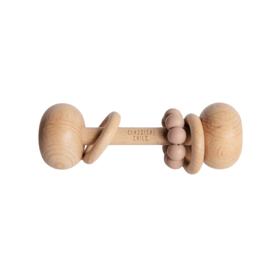 A Classical Child beechwood baby rattle with beads on it.