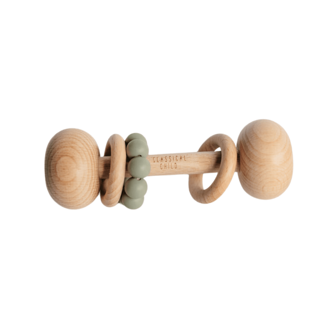 A Classical Child Beechwood & Silicone baby rattle with a green bead on it.