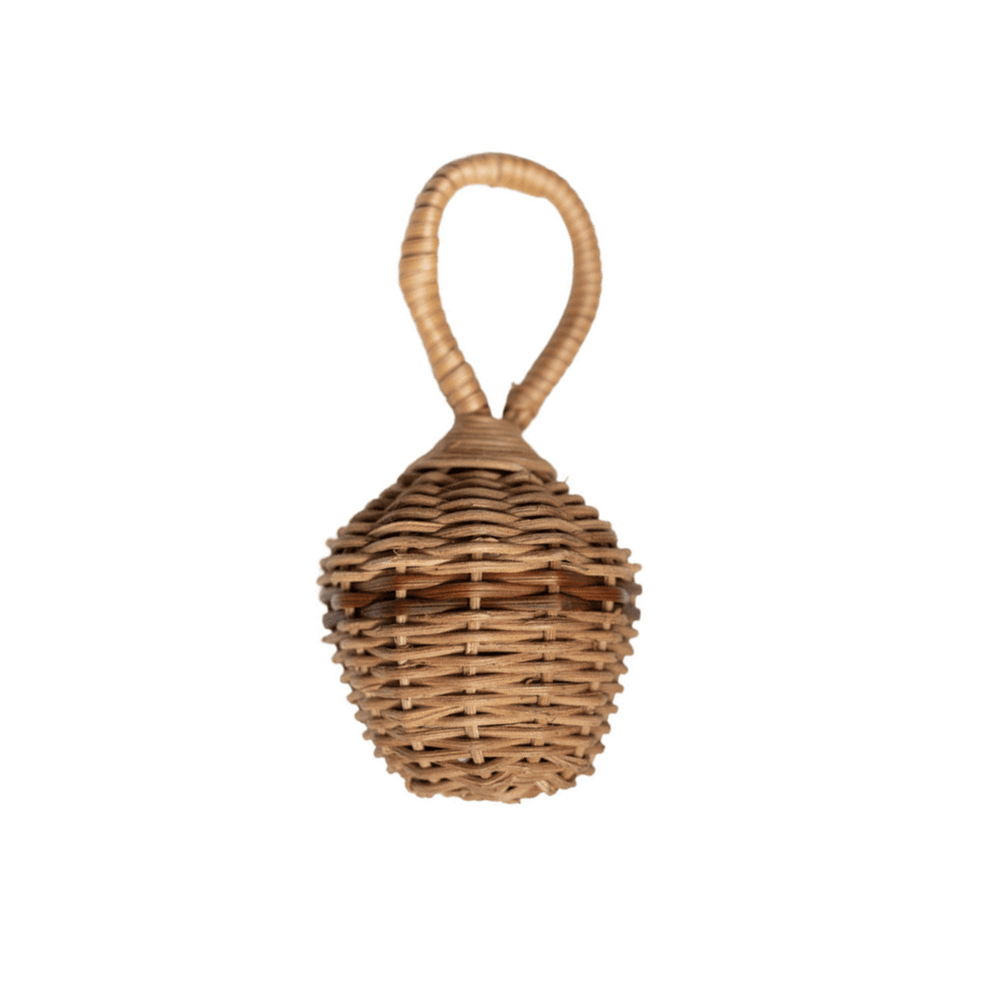 A Classical Child rattan wicker basket with a handle on a white background.