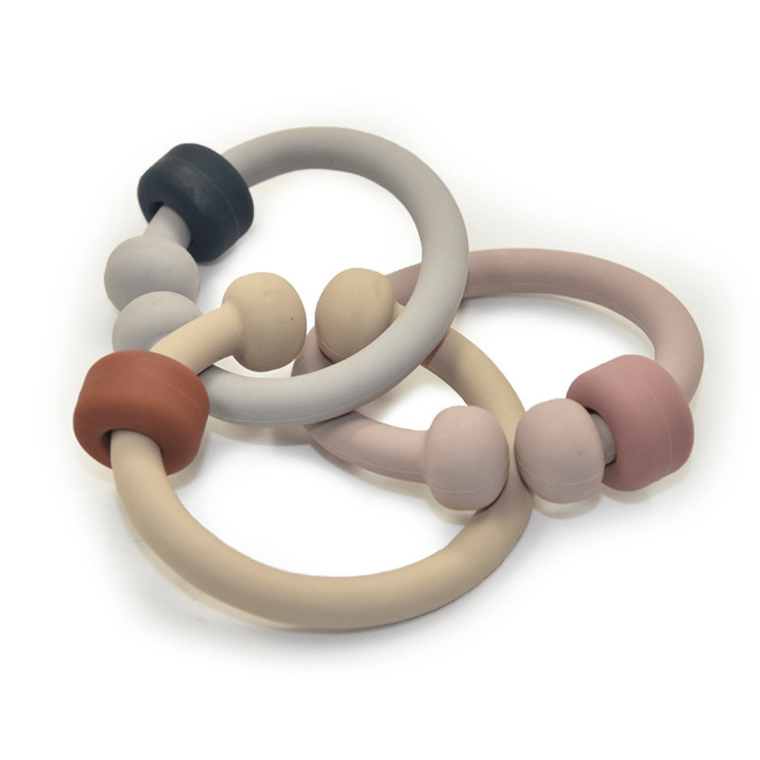 This set of Classical Child Silicone Detail Links is the perfect baby toy for providing teething relief. Each ring comes in a different color, making them visually appealing to your little one.