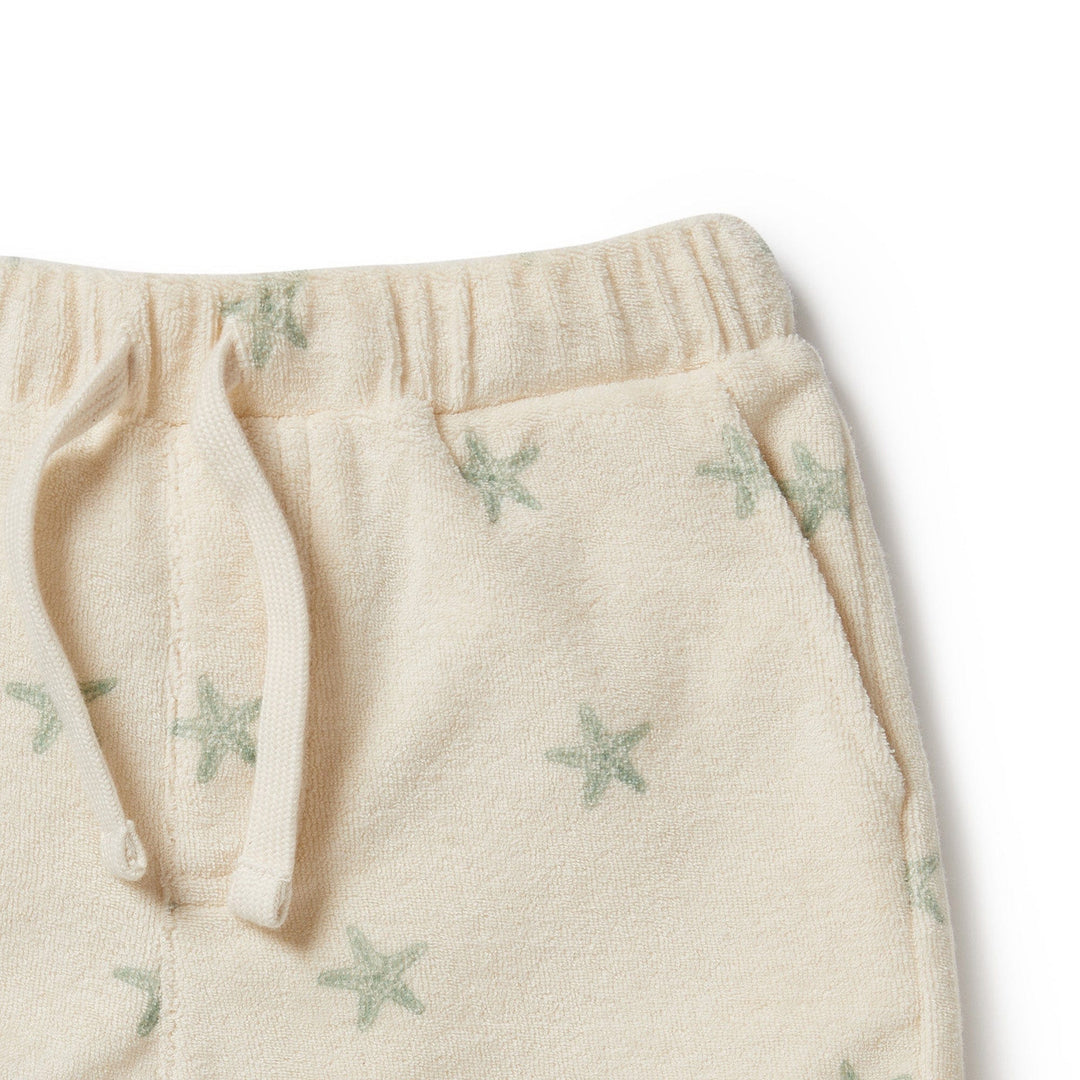 Wilson & Frenchy Organic Terry Kids Shorts with stars on them, perfect for summer days.