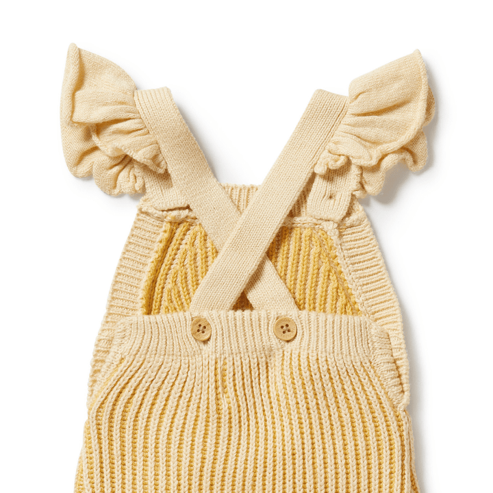 Close-Up-Of-Buttons-On-The-Back-Of-Wilson-And-Frenchy-Knitted-Ruffle-Overalls-Dijon-Naked-Baby-Eco-Boutique