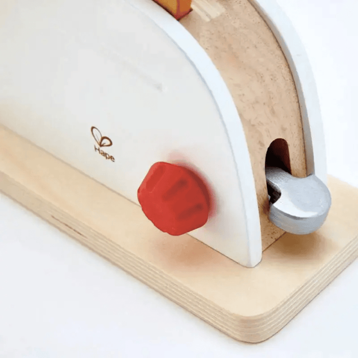 Close-Up-Of-Features-On-Hape-Pop-Up-Toaster-Naked-Baby-Eco-Boutique