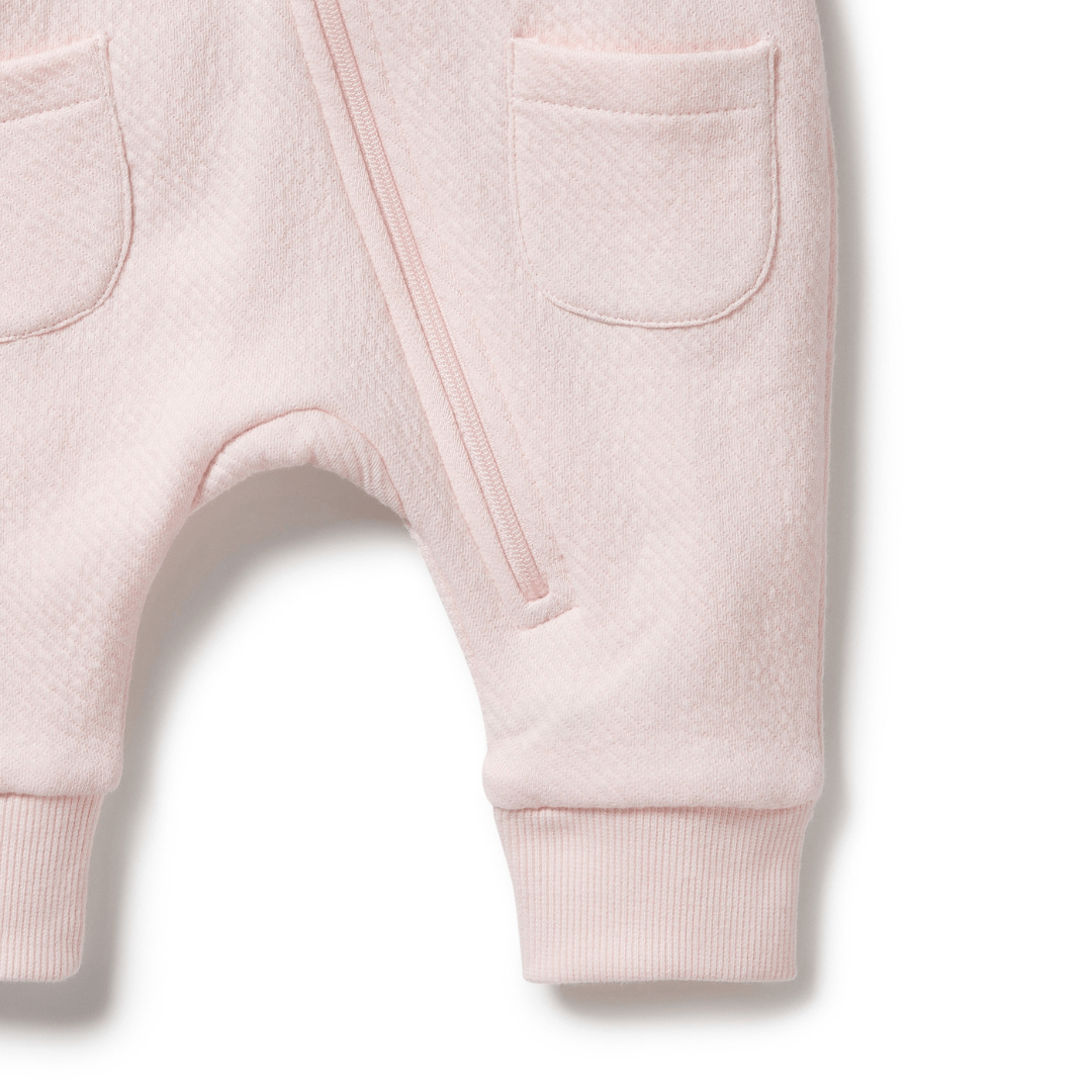 Close-Up-Of-Leg-And-Zip-On-Wilson-And-Frenchy-Organic-Quilted-Growsuit-Pink-Naked-Baby-Eco-Boutique