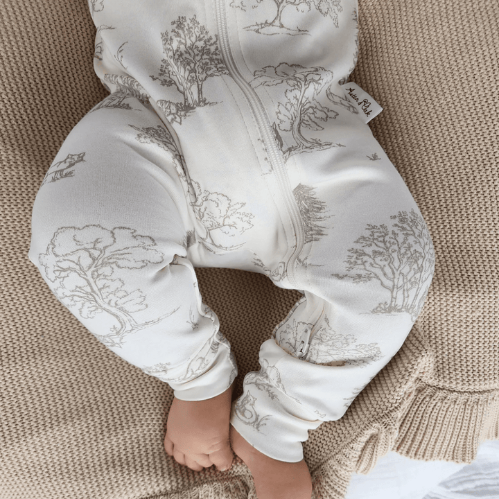 Close-Up-Of-Little-Toes-In-Aster-And-Oak-Organic-Long-Sleeved-Zip-Romper-Fox-Woods-Naked-Baby-Eco-Boutique