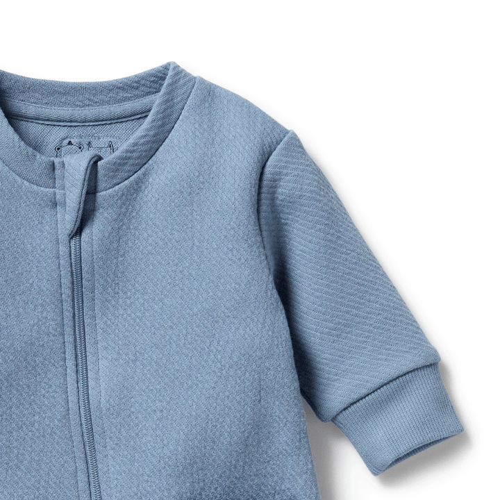 Close-Up-Of-Neck-And-Sleeve-On-Wilson-And-Frenchy-Organic-Quilted-Growsuit-Naked-Baby-Eco-Boutique