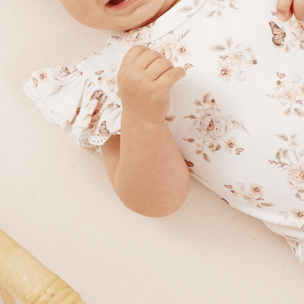 Close-Up-Of-Print-On-Aster-And-Oak-Organic-Cotton-Butterfly-Lace-Onesie-Naked-Baby-Eco-Boutique