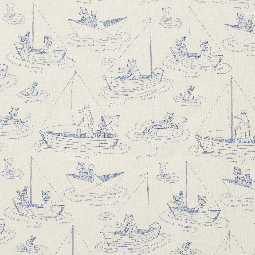 Close-Up-Of-Print-On-Wilson-And-Frenchy-Organic-Cotton-Cot-Sheet-Sail-Away-Naked-Baby-Eco-Boutique