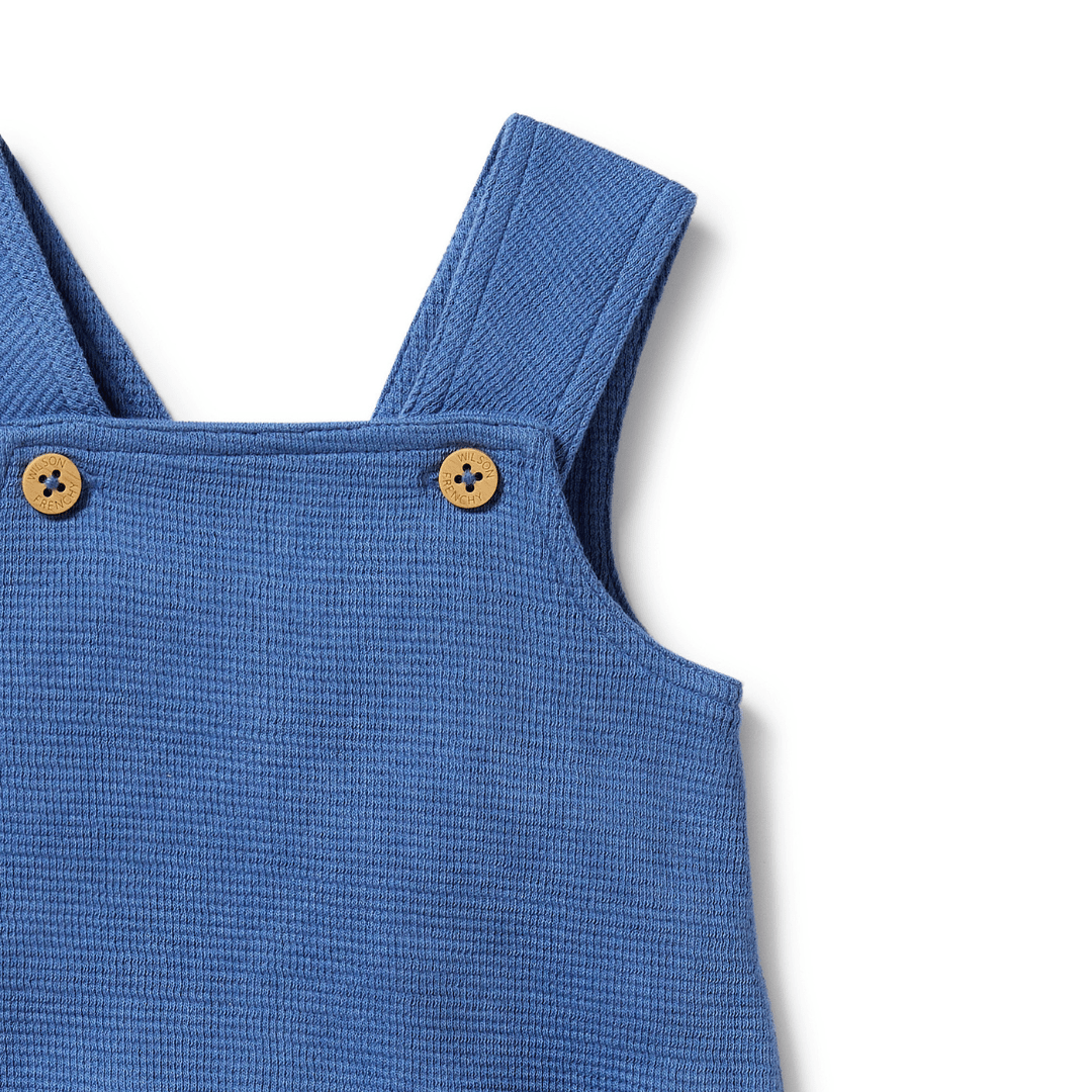 Close-Up-Of-Straps-And-Buttons-On-Wilson-And-Frenchy-Organic-Waffle-Overalls-Brilliant-Blue-Naked-Baby-Eco-Boutique