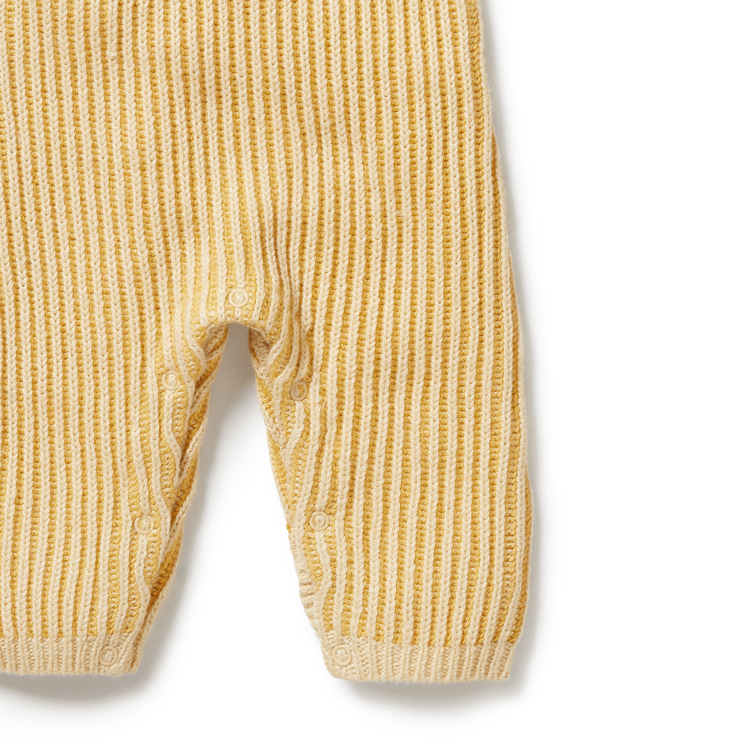 Close-Up-Of-The-Bottom-Of-Wilson-And-Frenchy-Knitted-Ruffle-Overalls-Dijon-Naked-Baby-Eco-Boutique