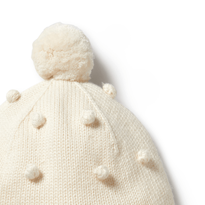 Close-Up-Of-Wilson-And-Frenchy-Knitted-Bauble-Bonnet-Ecru-Naked-Baby-Eco-Boutique
