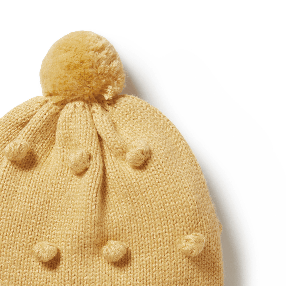 Close-Up-Of-Wilson-And-Frenchy-Knitted-Bauble-Hat-Dijon-Naked-Baby-Eco-Boutique