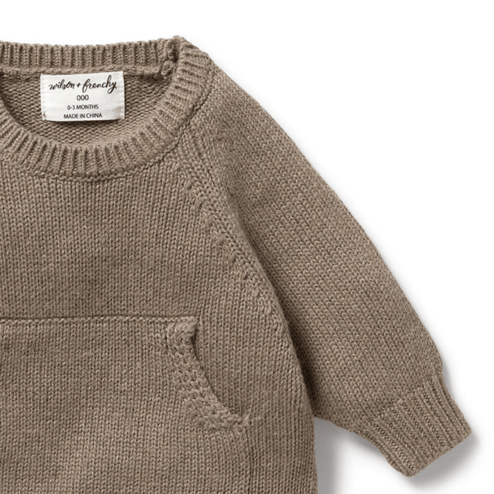Child's knitted beige Wilson & Frenchy Knitted Pocket Jumper with a pocket detail.