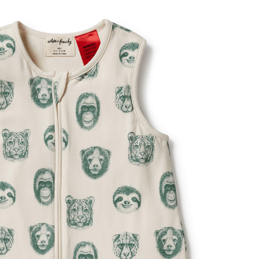 A white and green sleeveless Wilson & Frenchy Organic Cotton Summer Sleeping Bag made of organic cotton, featuring images of animals.