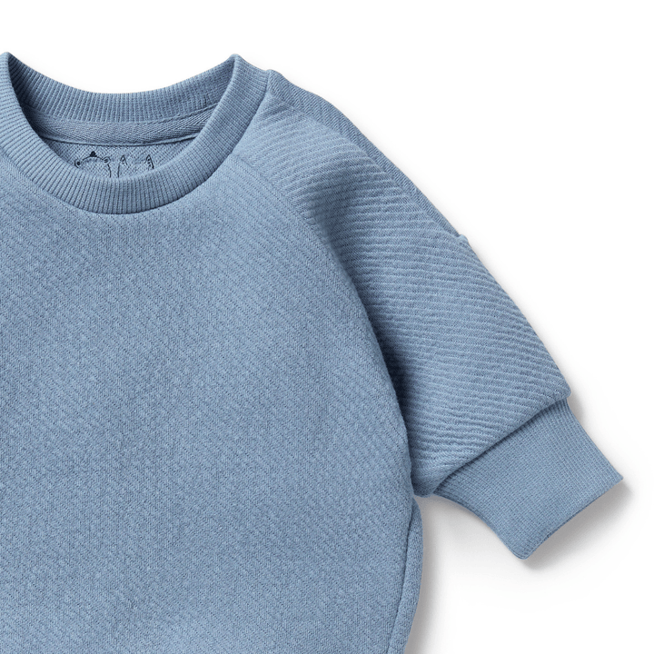 Close-Up-Of-Wilson-And-Frenchy-Organinc-Quilted-Sweat-Top-Storm-Blue-Naked-Baby-Eco-Boutique