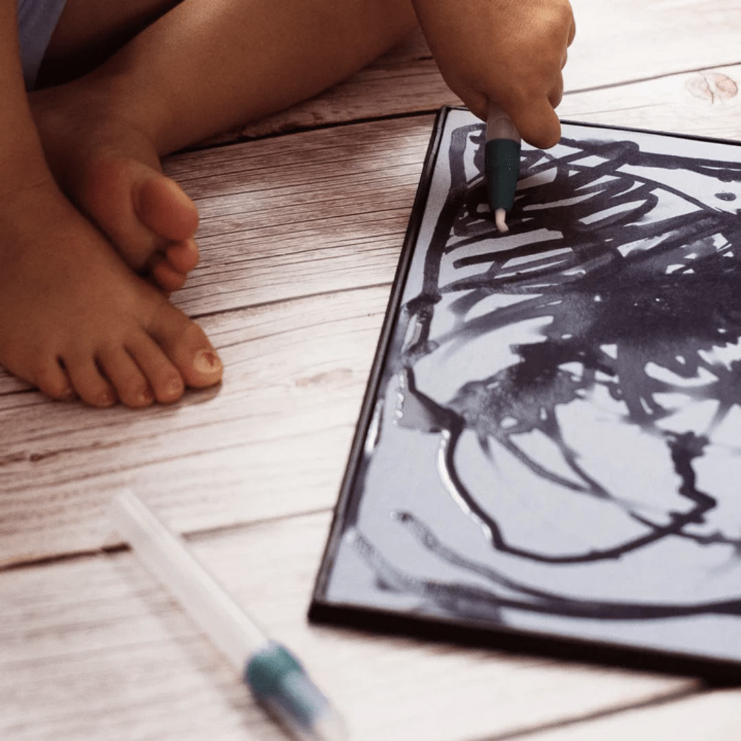 Close-Up-Of-Zazi-Magic-Water-Painting-Board-And-Pens-Naked-Baby-Eco-Boutique