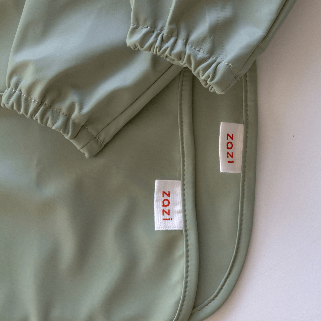 A Zazi Recycled Full-Sleeved Bib (Multiple Variants) with a white label on it.