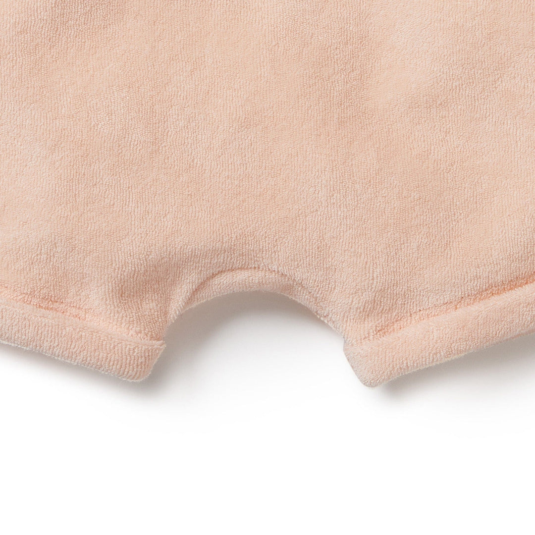 A close up of Wilson & Frenchy Organic Terry Cuffed Kids Shorts in a charming pink color.