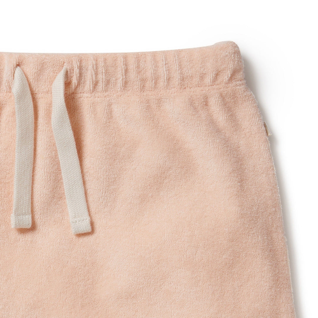 A Wilson & Frenchy Organic Terry Cuffed Kids Shorts (Multiple Variants) made of organic cotton, featuring a white drawstring.