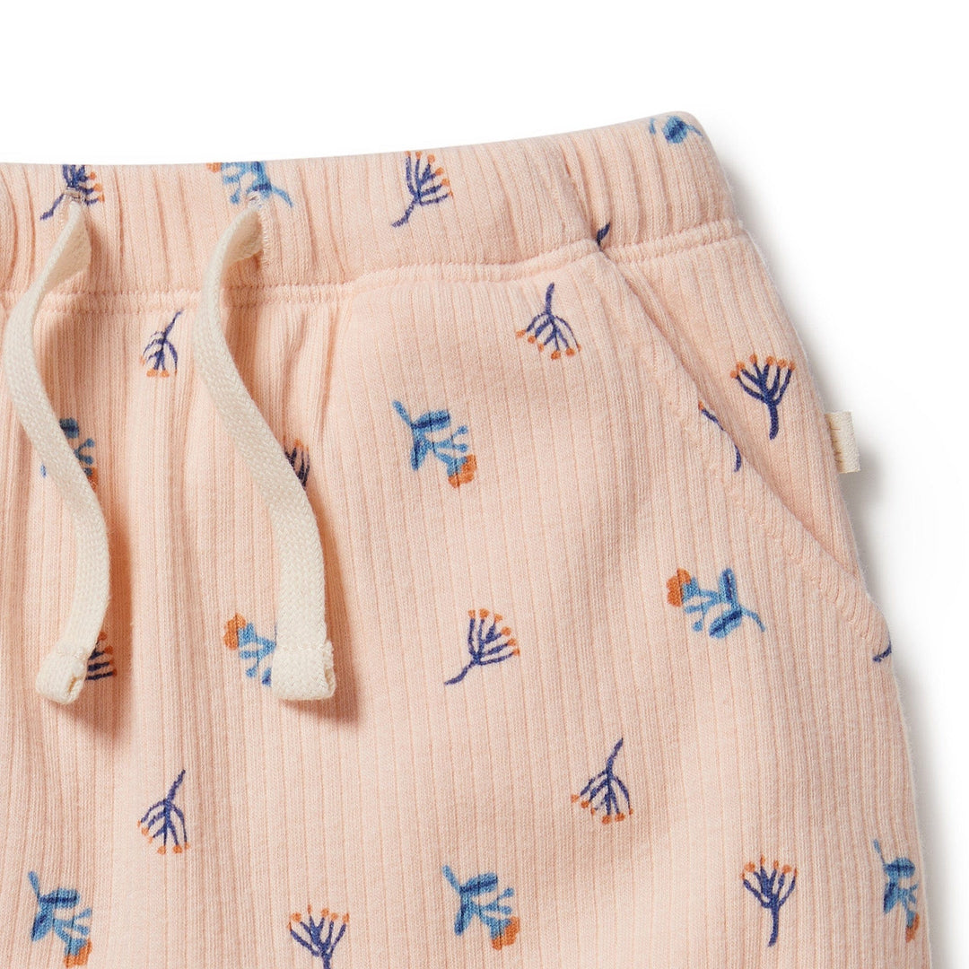 Wilson & Frenchy Little Flower Organic Rib Bloomer Shorts with an adjustable waistband and blue flowers.